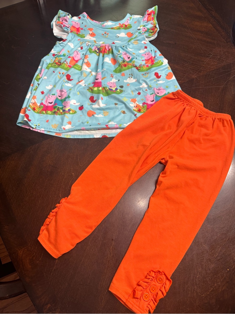 Girls Light Blue Peppa Pig Print Top with Orange Ruffle Hem Leggings VGUC